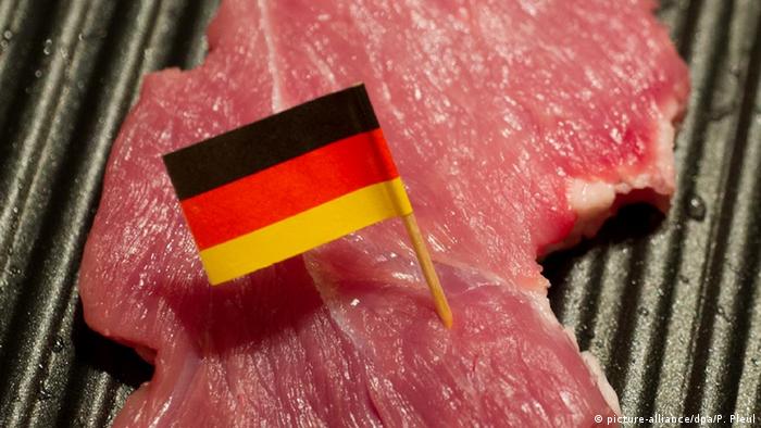 A piece of meat with a small German flag 