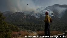 September 14, 2020, Forest Falls, California, USA: Captain JAMES KLOSEK of the Santa Barbara County Fire Department observes Helicopter operations at the El Dorado Fire. The is at 39% containment as of Monday afternoon. (Credit Image: © Erick Madrid/ZUMA Wire |