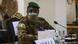 Colonel Assimi Goita wears a mask and military uniform as he attends an ECOWAS meeting in September 2020 Colonel Assimi Goita wears a mask and military uniform as he attends an ECOWAS meeting in September 2020