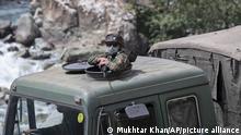 An Indian army soldier keeps guard on top of his vehicle as their convoy moves on the Srinagar- Ladakh highway at Gagangeer, northeast of Srinagar, Indian-controlled Kashmir, Tuesday, Sept. 1, 2020. India said Monday its soldiers thwarted â€œprovocativeâ€ movements by Chinaâ€™s military near a disputed border in the Ladakh region months into the rival nationsâ€™ deadliest standoff in decades. China's military said it was taking â€œnecessary actions in response, without giving details. (AP Photo/Mukhtar Khan)