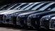 A row of new Audi cars for sale A row of new Audi cars for sale