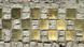 Gold rectangular blocks bearing names, set into concrete in a checkerboard fashion Gold rectangular blocks bearing names, set into concrete in a checkerboard fashion