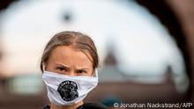 TOPSHOT - Swedish climate activist Greta Thunberg takes part in a Fridays For Future protest in front of the Swedish Parliament (Riksdagen) in Stockholm on September 25, 2020. (Photo by JONATHAN NACKSTRAND / AFP)