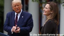 WASHINGTON, DC - SEPTEMBER 26: U.S. President Donald Trump (L) introduces 7th U.S. Circuit Court Judge Amy Coney Barrett as his nominee to the Supreme Court in the Rose Garden at the White House September 26, 2020 in Washington, DC. With 38 days until the election, Trump tapped Barrett to be his third Supreme Court nominee in just four years and to replace the late Associate Justice Ruth Bader Ginsburg, who will be buried at Arlington National Cemetery on Tuesday. (Photo by Chip Somodevilla/Getty Images)