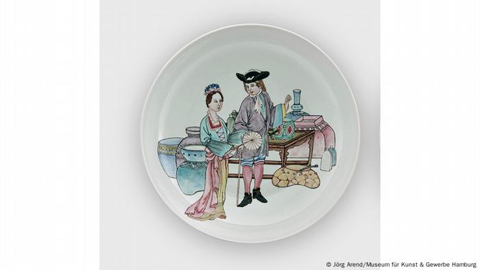 A porcelain plate depicting a young couple