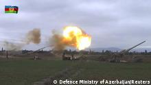 28.09.2020
A still image from a video released by the Azerbaijan's Defence Ministry shows members of Azeri armed forces firing artillery during clashes between Armenia and Azerbaijan over the territory of Nagorno-Karabakh in an unidentified location, in this still image from footage released September 28, 2020. Defence Ministry of Azerbaijan/Handout via REUTERS ATTENTION EDITORS - THIS IMAGE HAS BEEN SUPPLIED BY A THIRD PARTY. NO RESALES. NO ARCHIVES. MANDATORY CREDIT.