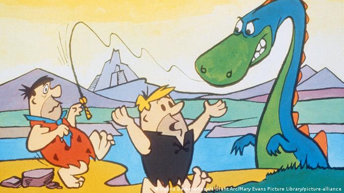 Fred has hooked an angry dinosaur on his fishing line while Barney runs for help