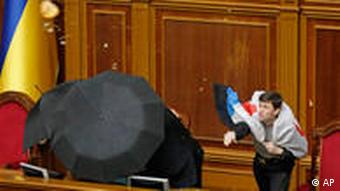 Ukrainian lawmakers in a physical altercation in the chambers