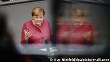 30.09.2020, Berlin: Bundeskanzlerin Angela Merkel (CDU) spricht während der Generaldebatte zum Bundeshaushalt im Bundestag. Foto: Kay Nietfeld/dpa +++ dpa-Bildfunk +++ | Verwendung weltweit