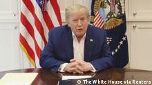 U.S. President Donald Trump, who is being treated for the coronavirus disease (COVID-19) in a military hospital outside Washington, speaks from his hospital room, in this still image taken from a video supplied by the White House, October 3, 2020. The White House/Handout via REUTERS THIS IMAGE HAS BEEN SUPPLIED BY A THIRD PARTY.