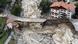 Flood waters surge under a partly collapsed bridge in Saint-Martin-Versubie Flood waters surge under a partly collapsed bridge in Saint-Martin-Versubie