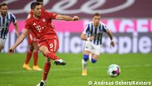 Soccer Football - Bundesliga - Bayern Munich v Hertha BSC - Allianz Arena, Munich, Germany - October 4, 2020. Bayern Munich’s Robert Lewandowski scores their fourth goal from the penalty spot. REUTERS/Andreas Gebert DFL regulations prohibit any use of photographs as image sequences and/or quasi-video.