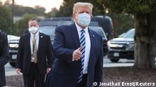 U.S. President Donald Trump gives a thumbs up as he departs Walter Reed National Military Medical Center after a fourth day of treatment for the coronavirus disease (COVID-19) to return to the White House in Washington from the hospital in Bethesda, Maryland, U.S., October 5, 2020. REUTERS/Jonathan Ernst