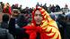A demonstrator wearing the national flag gestures during a protest against the results of a parliamentary election in Bishkek A demonstrator wearing the national flag gestures during a protest against the results of a parliamentary election in Bishkek