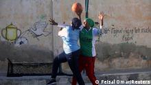 Somali women play basketball at a court within Hamar Jajab district of Mogadishu, Somalia September 16, 2020. Picture taken September 16, 2020. REUTERS/Feisal Omar