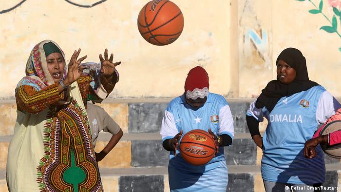 Former basketball player Nasra Mohamed leads Somali women during a basketball practice session in Mogadishu