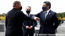 UAE Foreign Minister Sheikh Abdullah bin Zayed al-Nahyan and his Israeli counterpart Gabi Ashkenazi greet as they visit the Holocaust memorial together with German Foreign Minister Heiko Maas prior to their historic meeting in Berlin, Germany October 6, 2020. REUTERS/Michele Tantussi