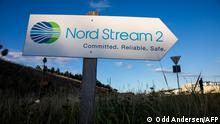 (FILES) This file photo taken on September 7, 2020 shows a road sign directing traffic towards the Nord Stream 2 gas line landfall facility entrance in Lubmin, north eastern Germany. - Poland's anti-monopoly watchdog on Wednesday, October 7, 2020 said it was demanding Russian gas giant Gazprom pay a 6.45 billion euro ($7.58 billion) fine over the Nord Stream 2 pipeline linking Russia to Germany. (Photo by Odd ANDERSEN / AFP)