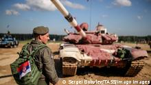 MOSCOW REGION, RUSSIA - JULY 31, 2018: A member of the Serbian team near a T-72B3 tank before an individual race in Stage 1 of the Tank Biathlon Contest at the 2018 International Army Games in Alabino, Moscow Region. Sergei Bobylev/TASS PUBLICATIONxINxGERxAUTxONLY TS08B555