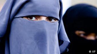 unidentified women are seen wearing a niqab