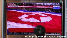 A file footage of North Korean flag is seen at a TV screen during a news program reporting about the North Korea at the Seoul Railway Station in Seoul, South Korea, Saturday, Oct. 10, 2020. North Korea is celebrating the 75th anniversary of its ruling party with outside observers expecting leader Kim Jong Un to take center stage in a massive military parade in capital Pyongyang. It wasn’t immediately clear whether any events were proceeding or had already taken place. (AP Photo/Lee Jin-man) |