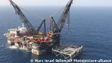 FILE - This Jan. 31, 2019***
file photo, shows an oil platform in the Leviathan natural gas field, in the Mediterranean Sea off the Israeli coast. Israel became a major energy exporter for the first time on Monday, Dec. 16, 2019, after signing a permit to export natural gas to neighboring Egypt. The announcement comes just days before a lucrative Israeli gas field in the Mediterranean Sea is expected to go online. (Marc Israel Sellem/Pool via AP, File) |