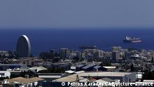 FILE - This Friday, July 6, 2018 file photo, shows the Oval building, left, one of a number of new high-rises transforming the skyline view, of the southern coastal city of Limassol in the eastern Mediterranean island of Cyprus. Cyprus government spokesman Kyriakos Koushos said on Tuesday, Oct. 13, 2020, that the Cabinet accepted a recommendation by the minsters of the interior and finance to cancel altogether the golden passport program that has netted billions of euros over several years. Koushos said the decision was based on the Cyprus Investment Program's long-standing weaknesses, but also the abuse of its provisions. (AP Photo/Petros Karadjias, File) |
