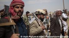 Tribesmen loyal to Houthi rebels hold their weapons as they attend a gathering against the agreement to establish diplomatic relations between Israel and the United Arab Emirates in Sanaa, Yemen, Saturday, Aug. 22, 2020. (AP Photo/Hani Mohammed) |