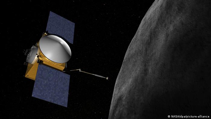 NASA spacecraft Osiris-Rex before the background of asteroid Bennu