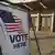 USA Iowa | "Vote Here" Schild an Wahllokal