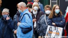 People wearing face masks are pictured at Schloss Strasse shopping street, as the coronavirus disease (COVID-19) outbreak continues, in Berlin, Germany, October 20, 2020. REUTERS/Fabrizio Bensch
