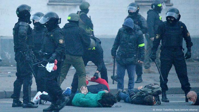 Riot police detain protesters during an opposition rally to reject the presidential election results in Minsk, Belarus