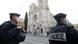 Police officers stand guard at the scene of a reported knife attack at Notre Dame church in Nice Police officers stand guard at the scene of a reported knife attack at Notre Dame church in Nice