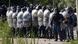 Foto de archivo de policías con equipo antidisturbios en Argentina. Foto de archivo de policías con equipo antidisturbios en Argentina.