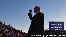 October 30, 2020***
US President Donald Trump gestures to supporters after speaking at a campaign rally at Green Bay Austin Straubel International Airport in Green Bay, Wisconsin on October 30, 2020. (Photo by MANDEL NGAN / AFP) (Photo by MANDEL NGAN/AFP via Getty Images)