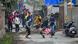 Kashmiri protesters throw stones towards the government forces on the outskirts of Srinagar Kashmiri protesters throw stones towards the government forces on the outskirts of Srinagar