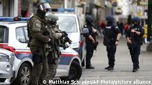 Police officers guard the scene in Vienna, Austria, Tuesday, Nov. 3, 2020. Police in the Austrian capital said several shots were fired shortly after 8 p.m. local time on Monday, Nov. 2, in a lively street in the city center of Vienna. Austria's top security official said authorities believe there were several gunmen involved and that a police operation was still ongoing. (AP Photo/Matthias Schrader) |