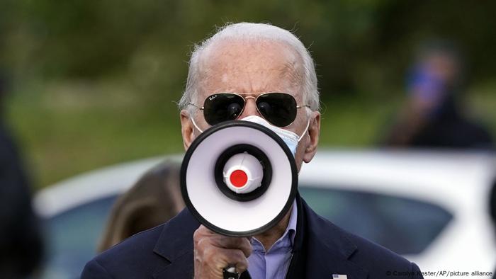 Joe Biden speaking through a megaphone