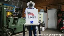 RICHLAND, IOWA - NOVEMBER 03: A voter marks his ballot at a polling place in Dennis Wilkening's shed on November 3, 2020 in Richland, Iowa. After a record-breaking early voting turnout, Americans head to the polls on Election Day to cast their vote for incumbent U.S. President Donald Trump or Democratic nominee Joe Biden in the 2020 presidential election. (Photo by Mario Tama/Getty Images)
