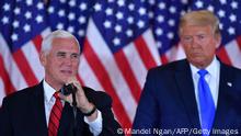 US Vice President Mike Pence (L) speaks flanked by US President Donald Trump during election night in the East Room of the White House in Washington, DC, early on November 4, 2020. (Photo by MANDEL NGAN / AFP) (Photo by MANDEL NGAN/AFP via Getty Images)