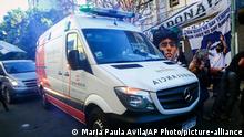 An ambulance transports former soccer star Diego Maradona to Buenos Aires, from the hospital he had been admitted to a day before in La Plata, Argentina, Tuesday, Nov. 3, 2020. His personal doctor Leopoldo Luque, who is neurologist, said Maradona has suffered a subdural hematoma, likely caused by an accident. The 1986 World Cup champion was admitted to a private hospital with signs of depression on Monday, three days after his 60th birthday. (AP Photo/Maria Paula Avila) |