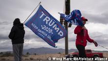 Supporters of President Donald Trump stand outside of the Clark County Elections Department in North Las Vegas, Nev. Saturday, Nov. 7, 2020. (AP Photo/Wong Maye-E) |