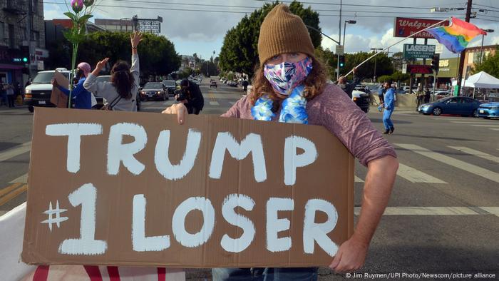 LA residents celebrate after several news organizations called the presidential election for Joe Biden and Kamala Harris