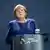 German Chancellor Angela Merkel delivers a statement in Berlin on the outcome of the 2020 US presidential election