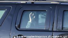 President Donald Trump waves to supporters as his motorcade arrives at the White House after golfing at his Trump National Golf Club in Sterling, Va., in Washington, Sunday, Nov. 8, 2020, a day after was defeated by President-elect Joe Biden. (AP Photo/J. Scott Applewhite) |