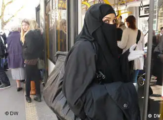 A woman in a niqab in a shopping district