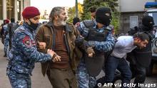 Armenian police officers detain protestors during a rally against the country's agreement to end fighting with Azerbaijan over the disputed Nagorno-Karabakh region in Yerevan on November 12, 2020. - Armenia on November 12, 2020 arrested 10 leading opposition figures for violently protesting against a Russian-brokered peace deal that ended weeks of fighting with Azerbaijan and sparked fury with Prime Minister Nikol Pashinyan. (Photo by Karen MINASYAN / AFP) (Photo by KAREN MINASYAN/AFP via Getty Images)