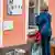 A woman is given a coronavirus test in Berlin