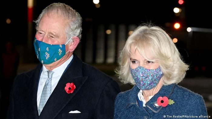 The Prince of Wales and the Duchess of Cornwall wearing marks during a visit to Germany during the COVID pandemic