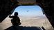 A soldier form the US 101st Airbone looks out at the partner Chinook following during a resupply mission in Jalalabad. Afghanistan A soldier form the US 101st Airbone looks out at the partner Chinook following during a resupply mission in Jalalabad. Afghanistan